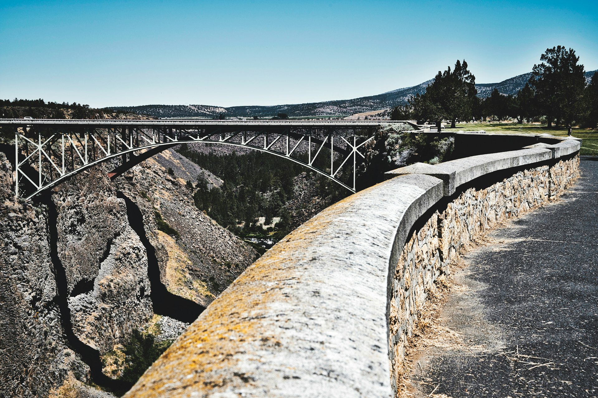 gray concrete bridge over river during daytime